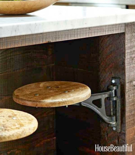 Stools on hinges save room in the kitchen.