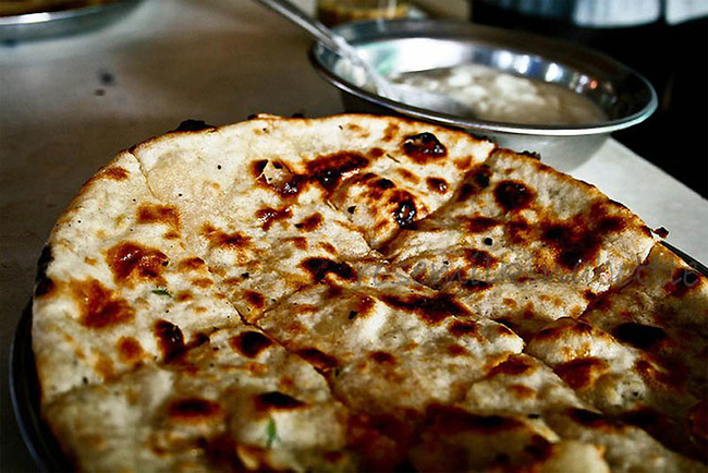 Pakistan: Here is an unleavened bread called Aloo Paratha. Sometimes it's stuffed with vegetables, and goes great with butter or some spicy sauce.