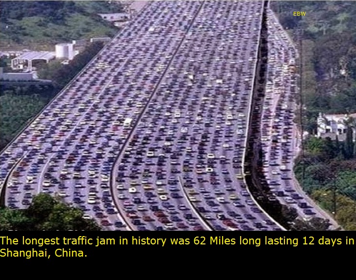 highway filled with cars - Ebw Kad 00 Domos The longest traffic jam in history was 62 Miles long lasting 12 days in Shanghai, China.