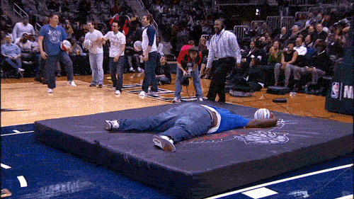 gifs - man face plants during a basketball game