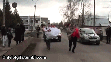 gifs - men running and holding a woman drops her