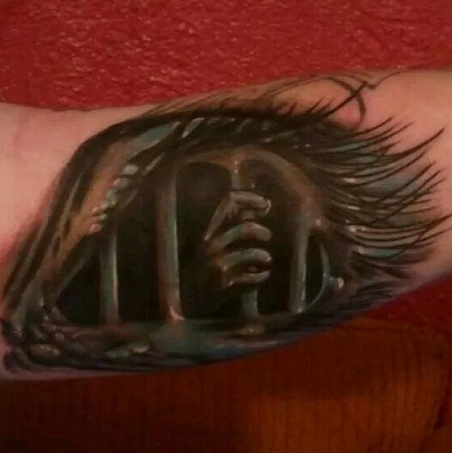 17 Terrifying Tattoos That Will Haunt Your Dreams