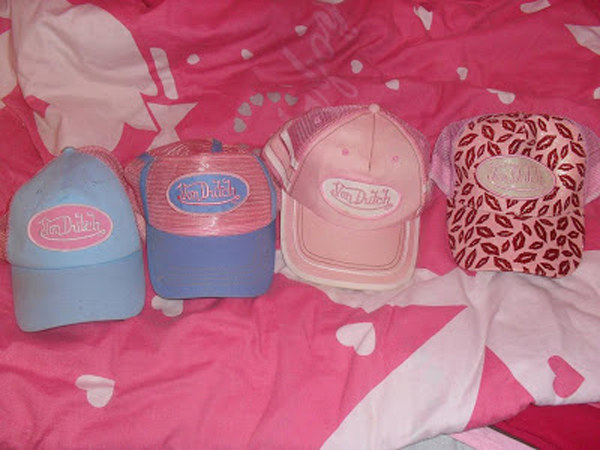 Had a sweet collection of pink Von Dutch trucker hats.