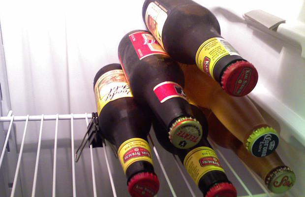 Section off your fridge with binder clips for beer.