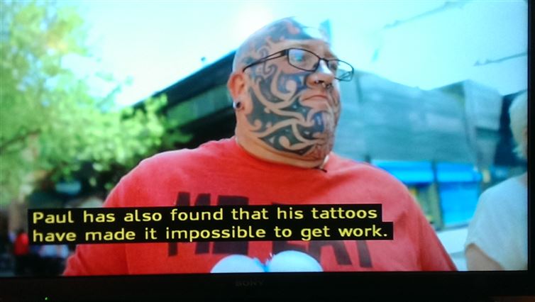 photo caption - Paul has also found that his tattoos have made it impossible to get work.