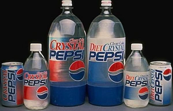 Crystal Pepsi
There really was no point to this stuff as it still tasted like Pepsi. But the whole thing about it being clear was so enticing. As a kid, it was impossible not to want this stuff.