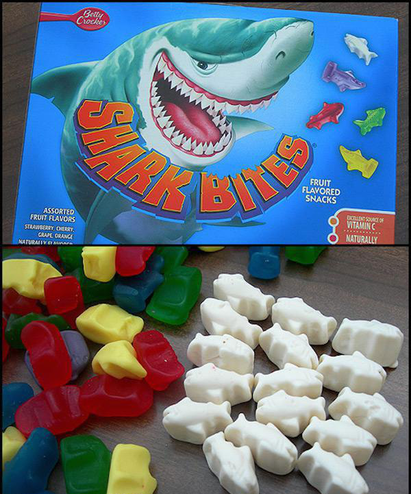 Shark Bites
Last but not least, Shark Bites. These were some of the best fruit snacks to grace grocery store shelves. There was just something so perfect about the flavor and consistency of these that made them absolutely perfect. Plus, they were in the shape of sharks. Every kid loves sharks.