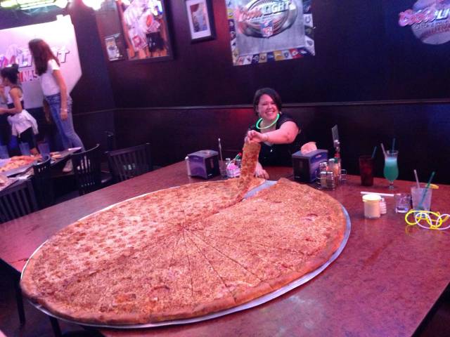“Pizza” at Big Lou, Texas ((1 topping giant pizza is about $60)