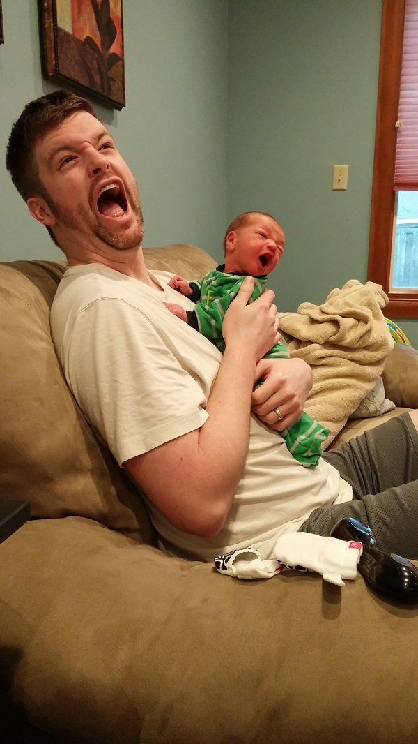 father and baby screaming