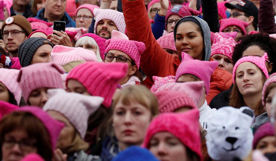 Here we have some feminist wearing vagina hats on their heads. I guess the irony is lost on them here. How about some tit key chains?