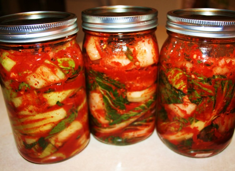 Korean cuisine is known for its kimchi. This is made by covering cabbage with a mixture that's both salty and spicy. It's then allowed to sit in an air tight jar for a couple of days.