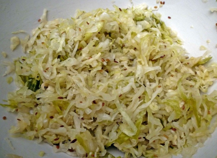Sauerkraut is a type of fermented cabbage. Itâ€™s made by mixing shredded cabbage with salt then letting it sit for a bit. Many people say that this is good for your digestion.