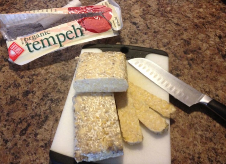 In Indonesia, tempeh is a staple. It's made by soaking whole soybeans in vinegar and allowing them to ferment. All of this is then bound together with mycelium, which is a sticky fungus.