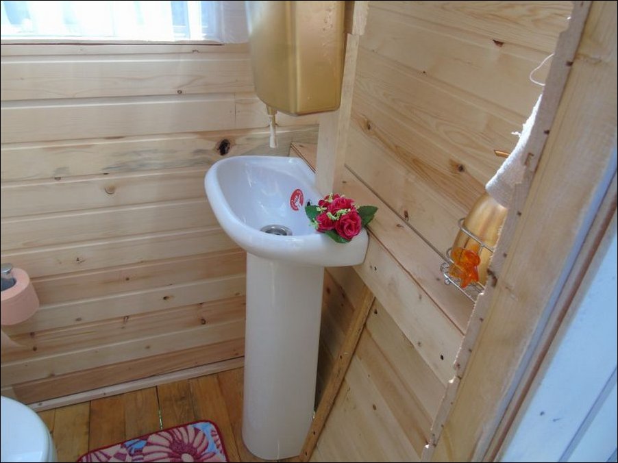 This Has Got To Be The Fanciest Outhouse In Existence