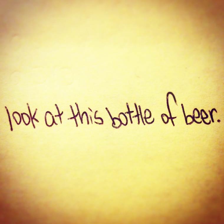 handwriting - look at this bottle of beer.