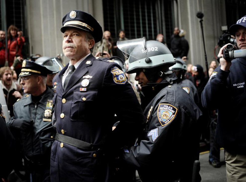 A former police captain was arrested for participating in a protest on Wall Street in 2011