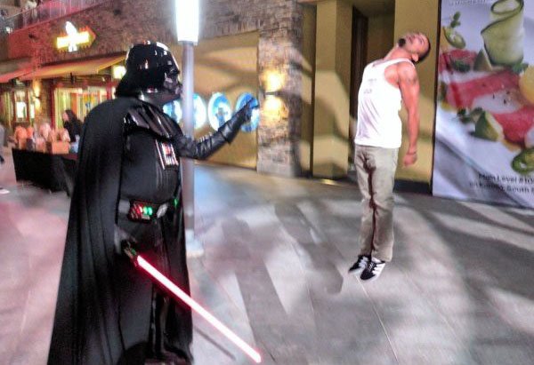 random picture of darth vader doing the power choke on a pedestrian in very well posed and excellent timing