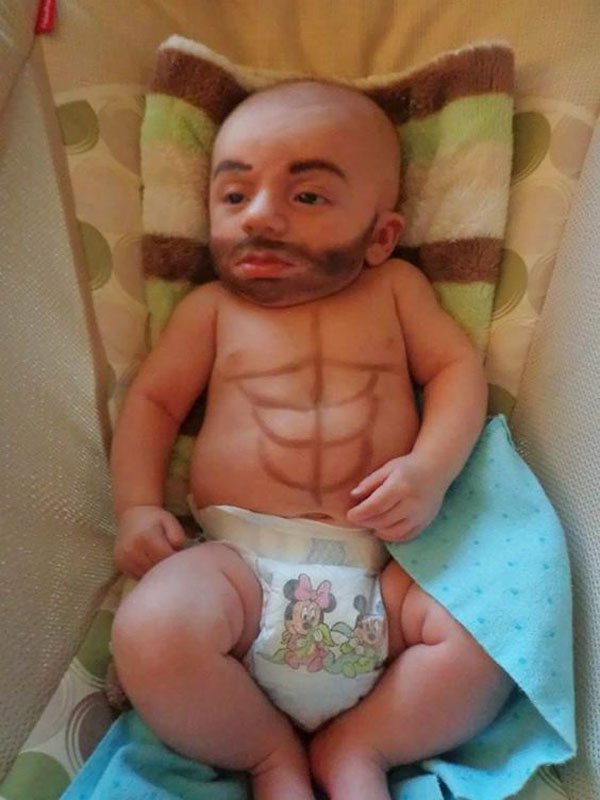 random picture of baby with makeup to look like old man with abs