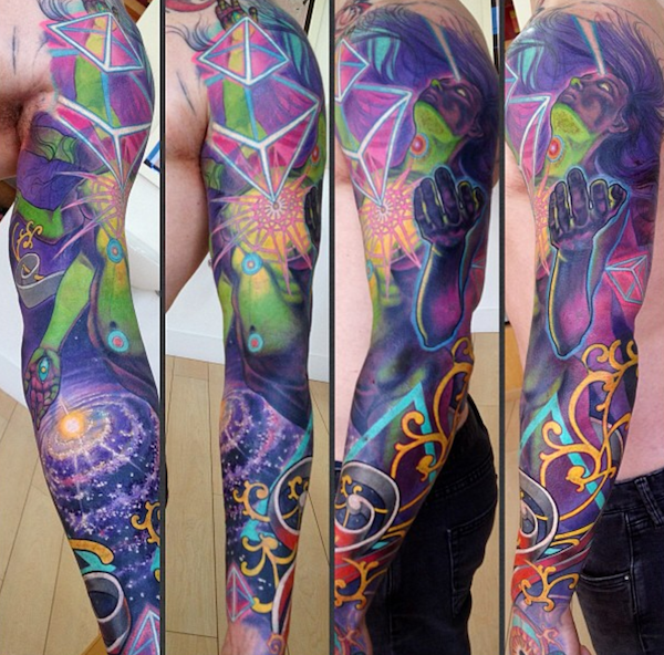geometric space tattoo sleeve