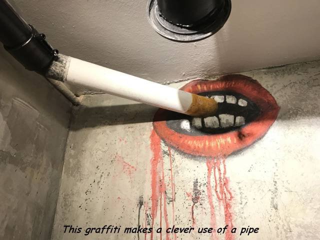 pipe graffiti - This graffiti makes a clever use of a pipe