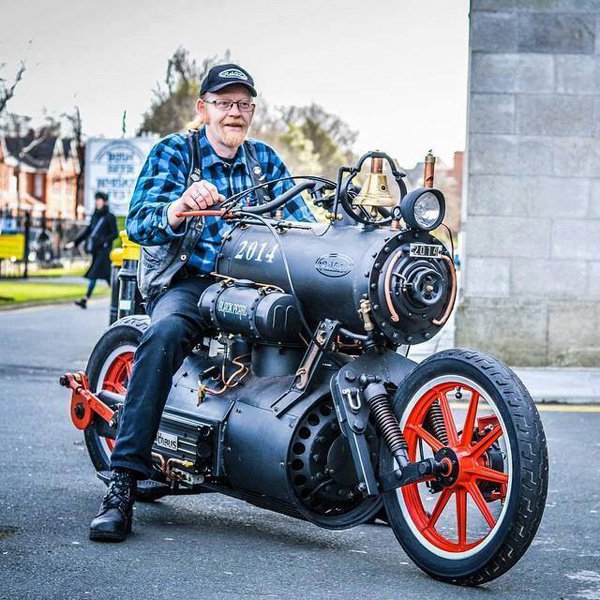 Man with seriously steampunk motorcycle