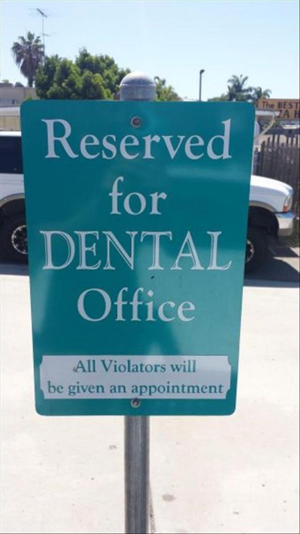 Parking spot for Dental office which will make you check your teeth if you park there.