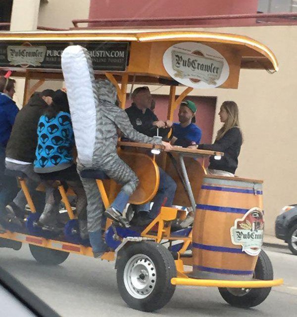 Cosplay of squirrell man on a drinking pedal bus pub crawler