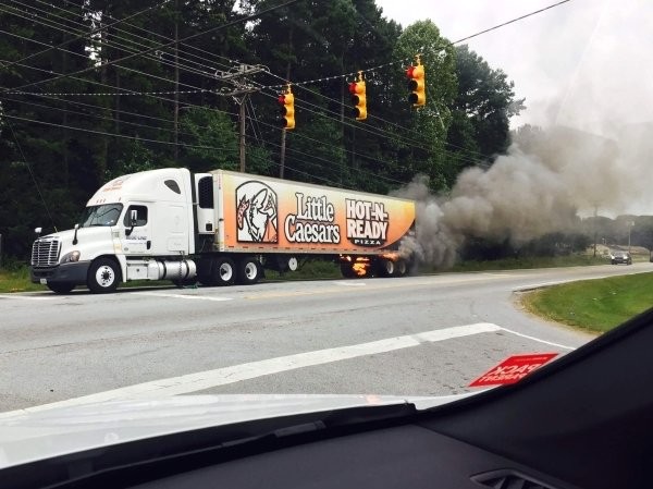 Little Caesars pizza truck on fire
