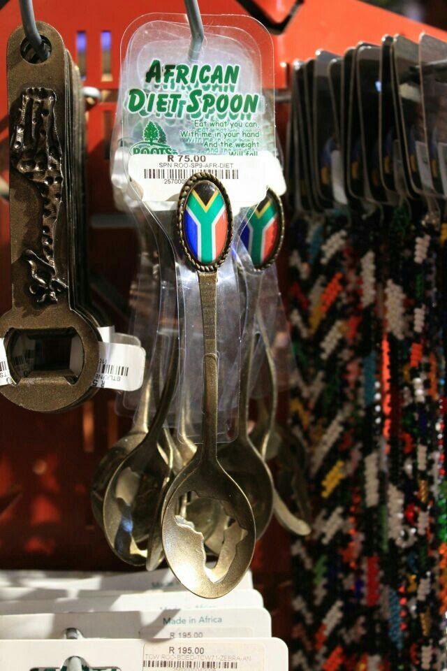 bottle - African Diet Spoon Omate 75.00 "Eat what you can With me in your hand ht. And the weight wall fall R 75.00 Spn RooSpAfr Det N S2 Made in Africa R 195 00 R 195.00 Tutti
