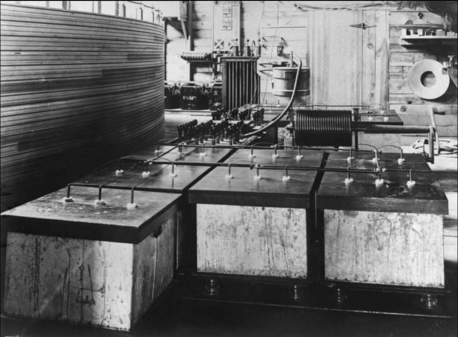 Tesla's Power Circuit -Everyone has seen photos of Tesla’s famous coil, but here’s what powered it; the primary circuit, showing an oil capacitor bank, supply transformer, rotary spark gap, and part of the secondary winding. The high voltage generator was built in his Colorado Springs laboratory in 1899, and the first time Tesla fired it up, the power overload set fire to the generator of the electric company, destroying it. Many of Tesla's experiments were either auctioned off or burned in fires.