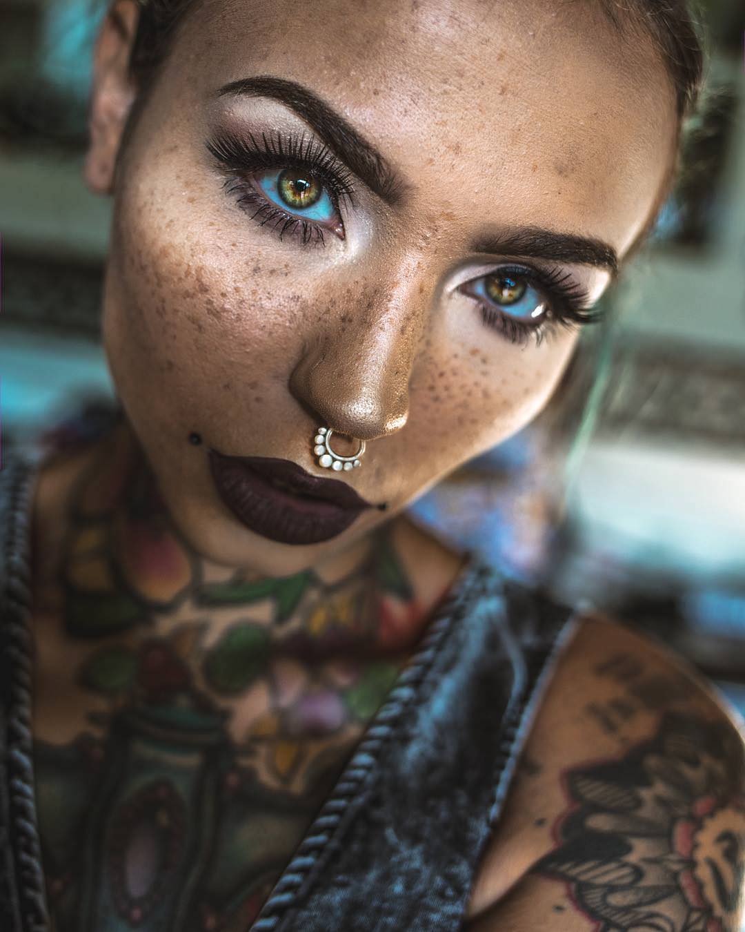 cool picture of girl who has tattoos on her eyes and body