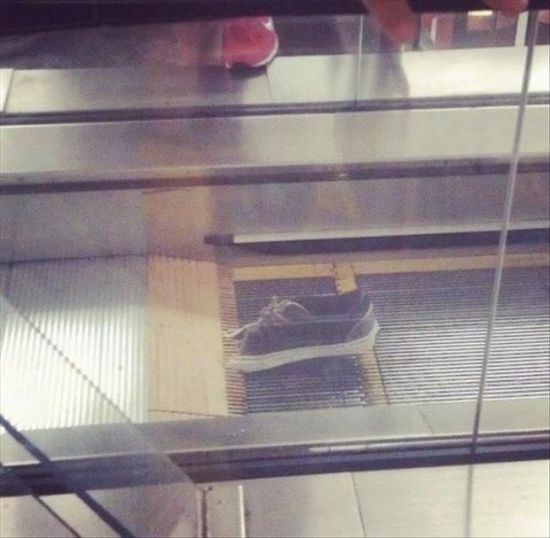bad luck shoe stuck in escalator