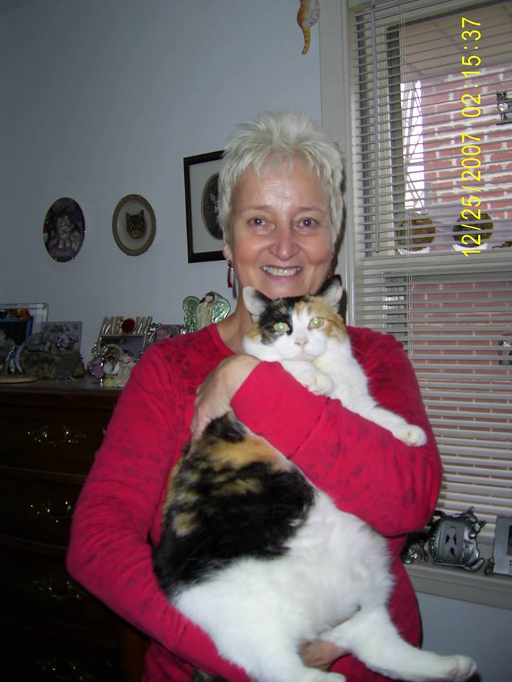 woman with an obese cat