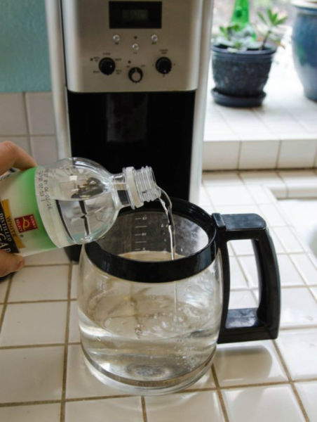 No-Scrub Coffee Pot Cleaner - If you're addicted to caffeine, your coffee pot probably shows it. Fill the reservoir with equal parts white vinegar and water. Run the brew cycle halfway through, then turn off and let it sit. After an hour, turn it on and let the cycle repeat. When its done, run two cycles with fresh water only.