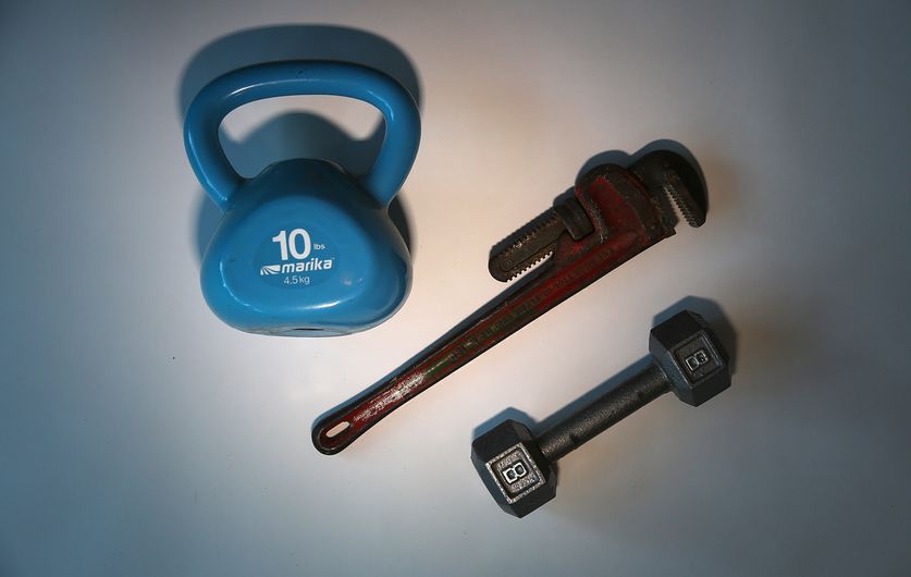 exercise weights and pipe wrench