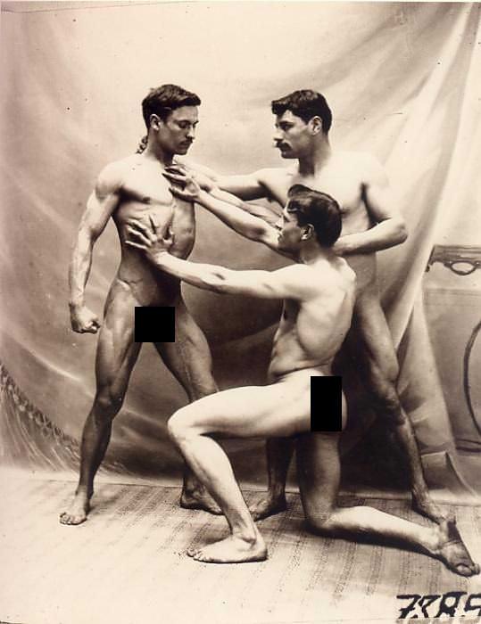 3 Male models pose nude for a French magazine in 1900. The sexual nature of France allowed such pictures to not only be accepted, but thrive. Magazines did up to 75 pictures in one edition of just men naked. One such example was La Beaute Magazine. It would be labelled as fine art and distributed all over the country, sometimes outside of it. The purchaser of these magazines was believed to be mostly gay men, and rarely women, even in France. Forgive the blacked out lines, but I did not want this flagged as mature.