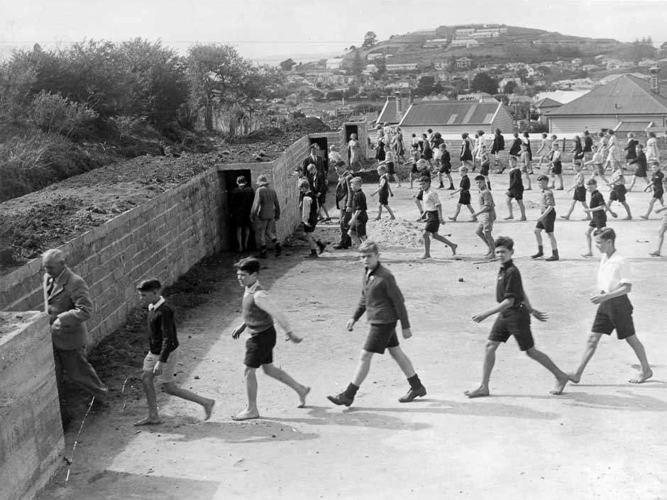 Students at Devonport Primary School in Auckland, New Zealand move to air raid shelters during a drill in 1941. As the Japanese advanced rapidly in the Pacific, they took over a huge area, and there were fears they would bomb and invade NZ. The Japanese did bomb Darwin in Australia, and were building an airfield on Guadalcanal to potential bomb both countries. The Kiwis were never bombed or invaded, as the Allies won the Battle of Guadalcanal and together put a halt to the Japanese advance. The Kiwis saw tons of action all over the world in support of Britain in particular. They were in Africa and Europe as well as the South Pacific. Of the 1.6 million people in NZ at the time, around 160,000 served, with 100,000 seeing involvement around the world, and 30,000 casualties. Their Air Force in particular was heavily involved in some major battles.