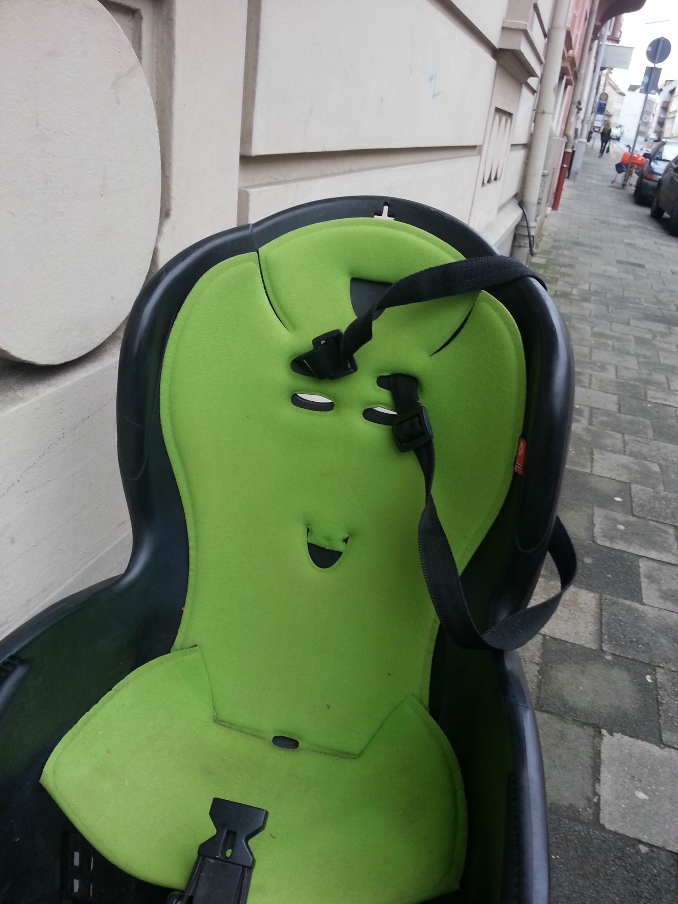 This childs bike seat looks like a stoned alien