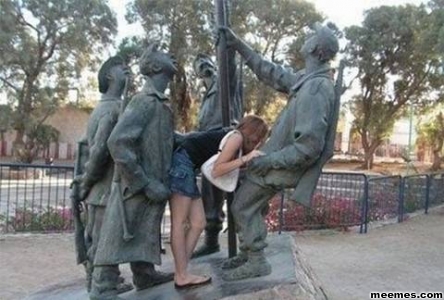 People Having Fun With Statues