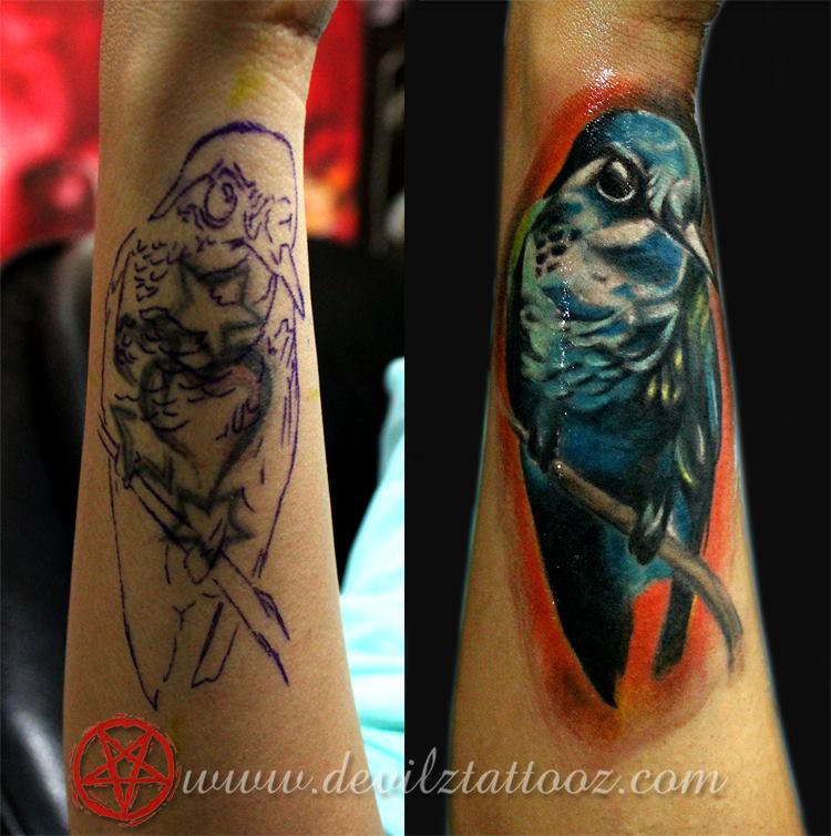 Amazing cover up of the old badly done tattoo Artist: Alex Done using