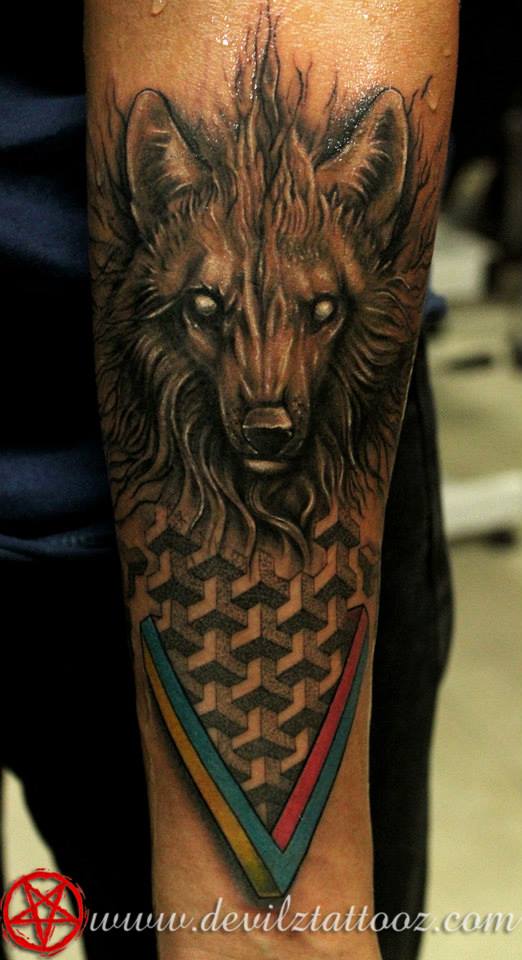 This one is on the Drummer of the same band from which the other guy got the Lion tattoo done See next pic similar style, same placement. For more see www.devilztattooz.com Artist: Alex