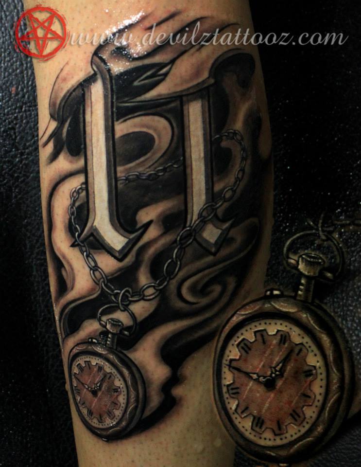 Abstract, customized 11 tattoo, the number and time displayed has personal significance to the client, you can see a better view of the pocket watch inset Artist: Alex