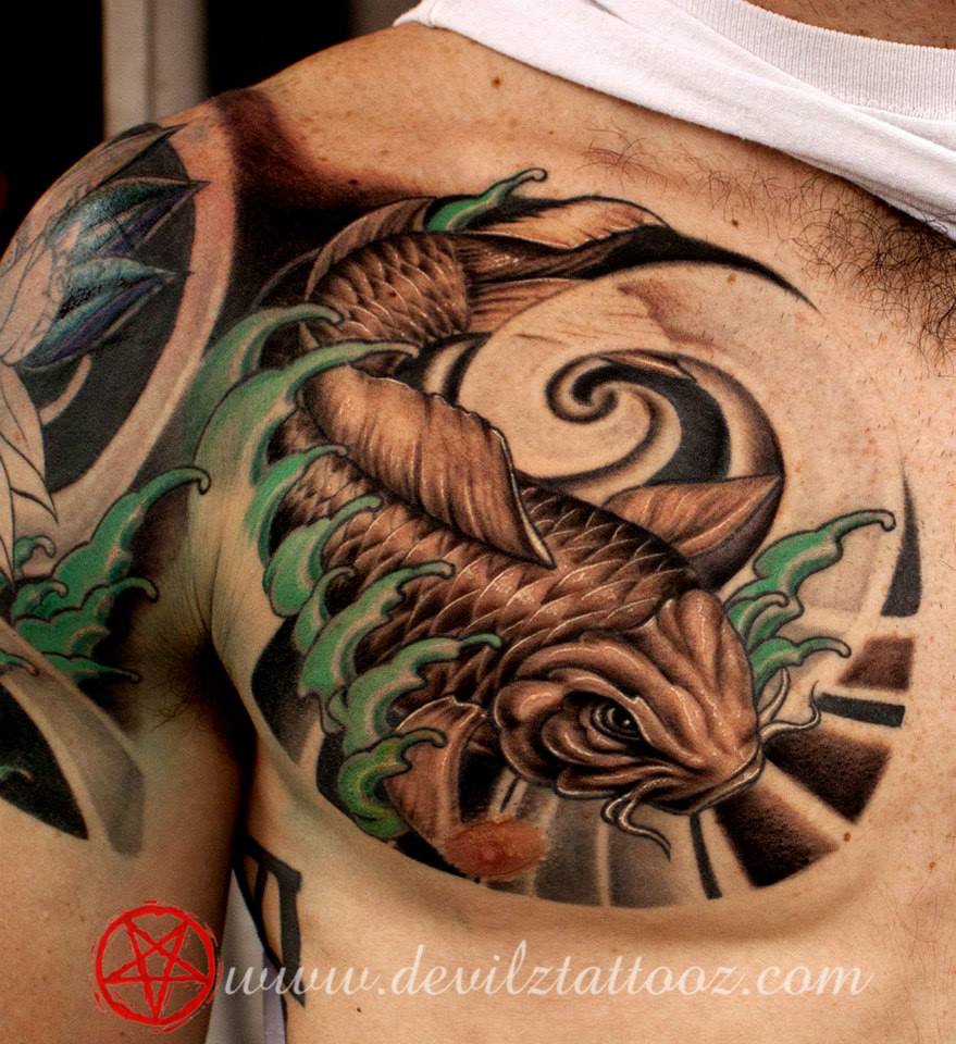 Japanese custom Koi fish chest piece, with freehand background, part of an ongoing coverup which covers the Chest, Bicep and Back, more on this soon Artist: Alex