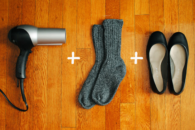 Break into your flats: You can do this by wearing socks, slipping on your shoes and aiming the hairdryer on the tight area for a few seconds while wiggling and stretching your feet inside the shoes. Ensure that you keep them on while they cool. Once done, remove the socks and test them out. If you still need more room, repeat the process again.