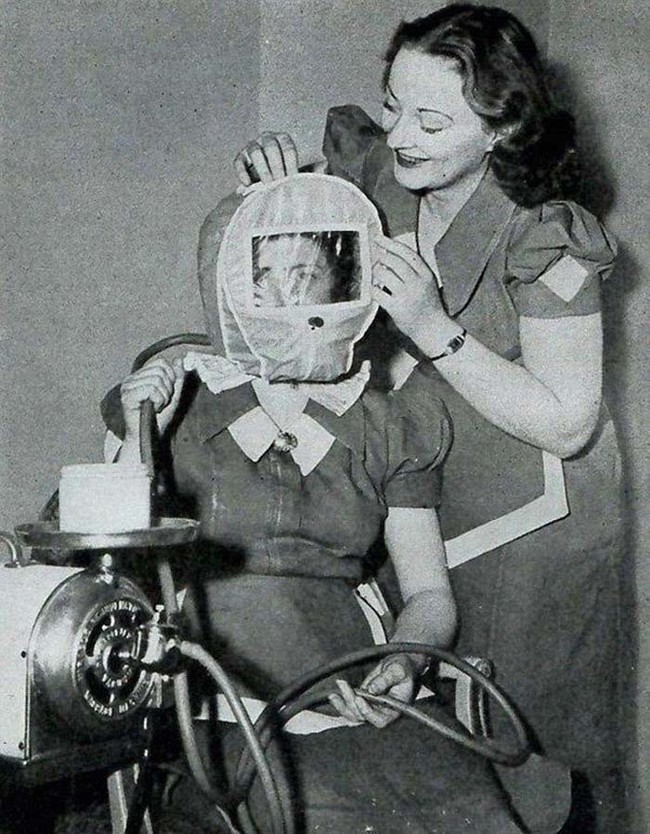 The woman in this photo is wearing a so called "Glamour Bonnet." The bonnet promised to give users a rosy, glowing complexion. It did this by lowering atmospheric pressure around the head to alpine conditions. Something about that doesn't sound safe
