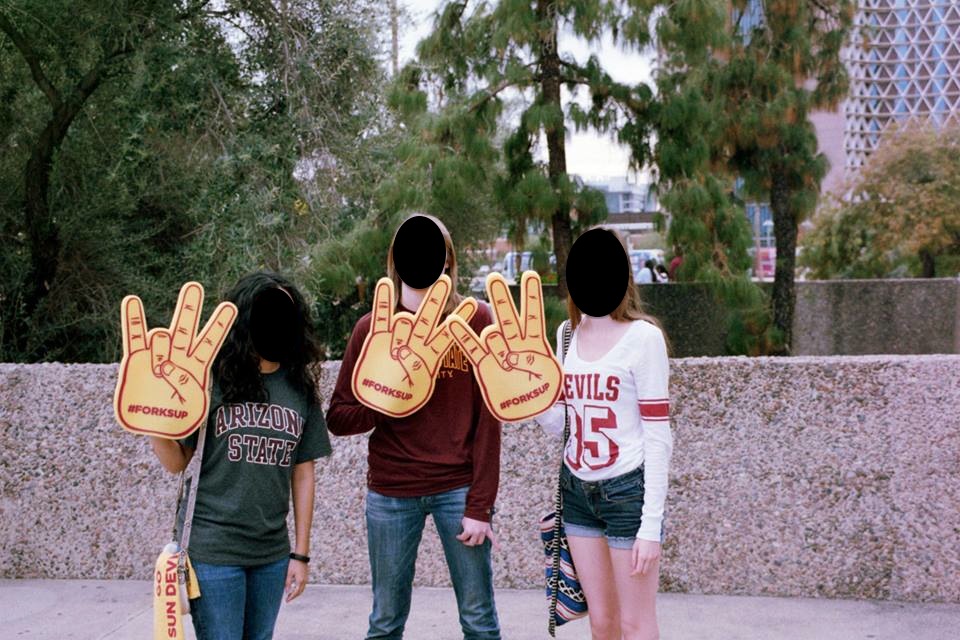 Arizona State University's pitchfork hand sign... more like 2 in the pink, 1 in the stink...