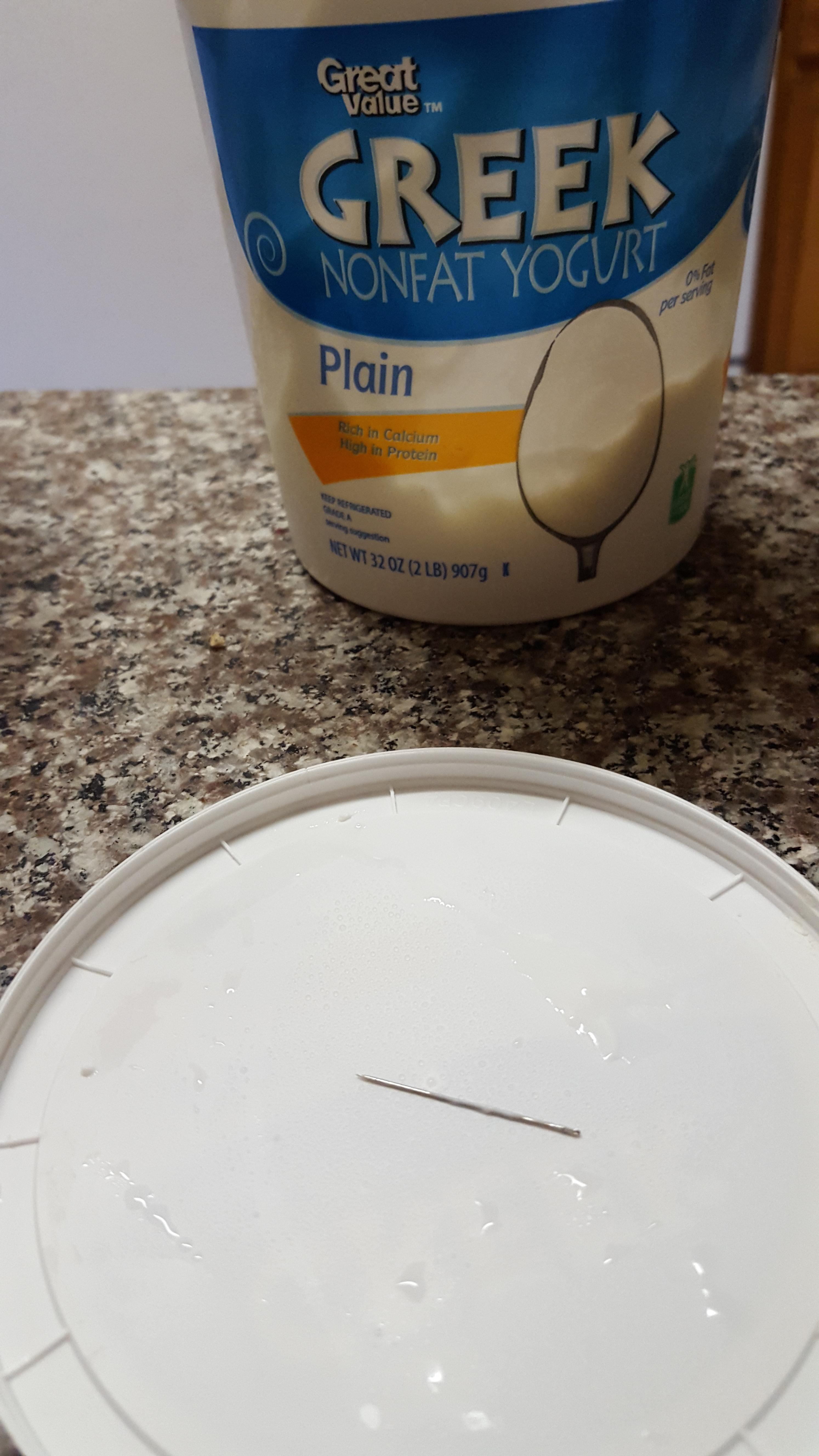 Someone found a needle in their yogurt.