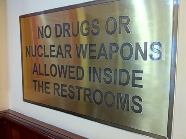 signage - No Drugs Or Nuclear Weapons Allowed Inside The Restrooms