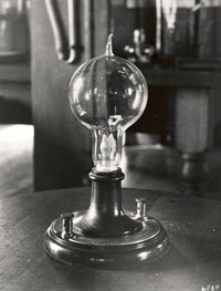 Edison was able to produce over 13 continuous hours of light with the cotton thread filament, and filed his first light bulb patent on January 27, 1880. Later, he and his researchers found that the ideal filament substance was carbonized bamboo, which produced over 1,200 hours of continuous light. The first large-scale test of Edison's lights occurred September 4, 1882 when 25 buildings in New York City's financial district were illuminated.