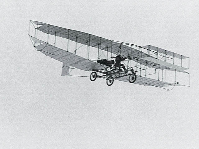 On December 17, 1903, Orville Wright piloted the first powered airplane 20 feet above a wind-swept beach in North Carolina. The flight lasted 12 seconds and covered 120 feet. Three more flights were made that day with Orville's brother Wilbur piloting the record flight lasting 59 seconds over a distance of 852 feet.